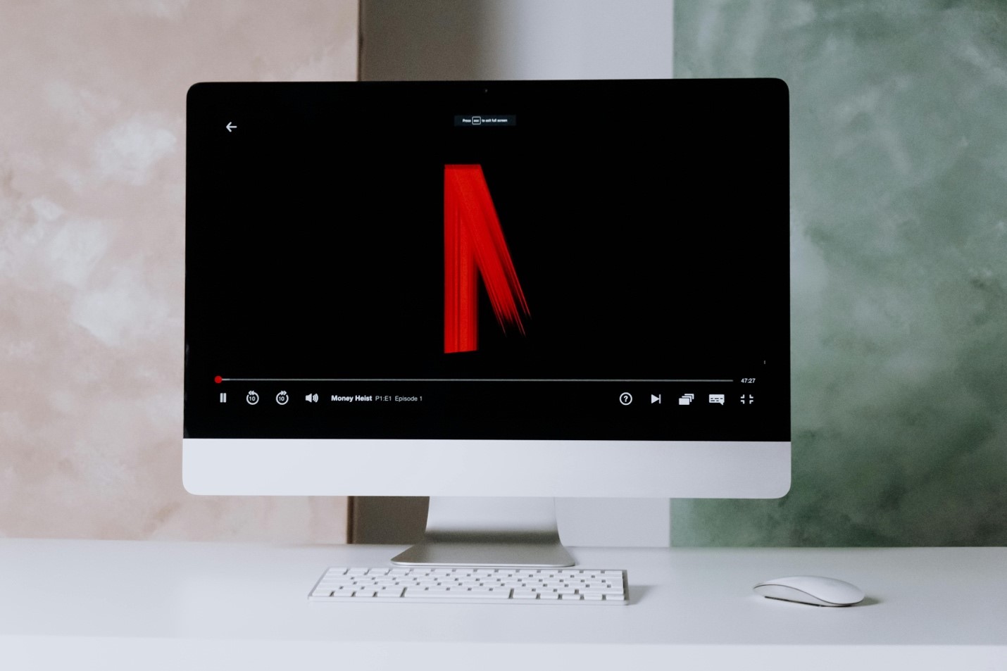 Desktop computer displaying Netflix, representing the evolution of streaming services.